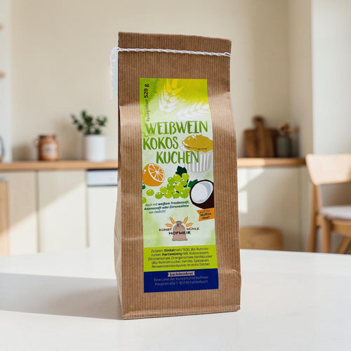 Papiertüte mit Etikett: Backmischung Weißwein-Kokos-Kuchen, 520 g, von der Kunstmühle Hofmeir