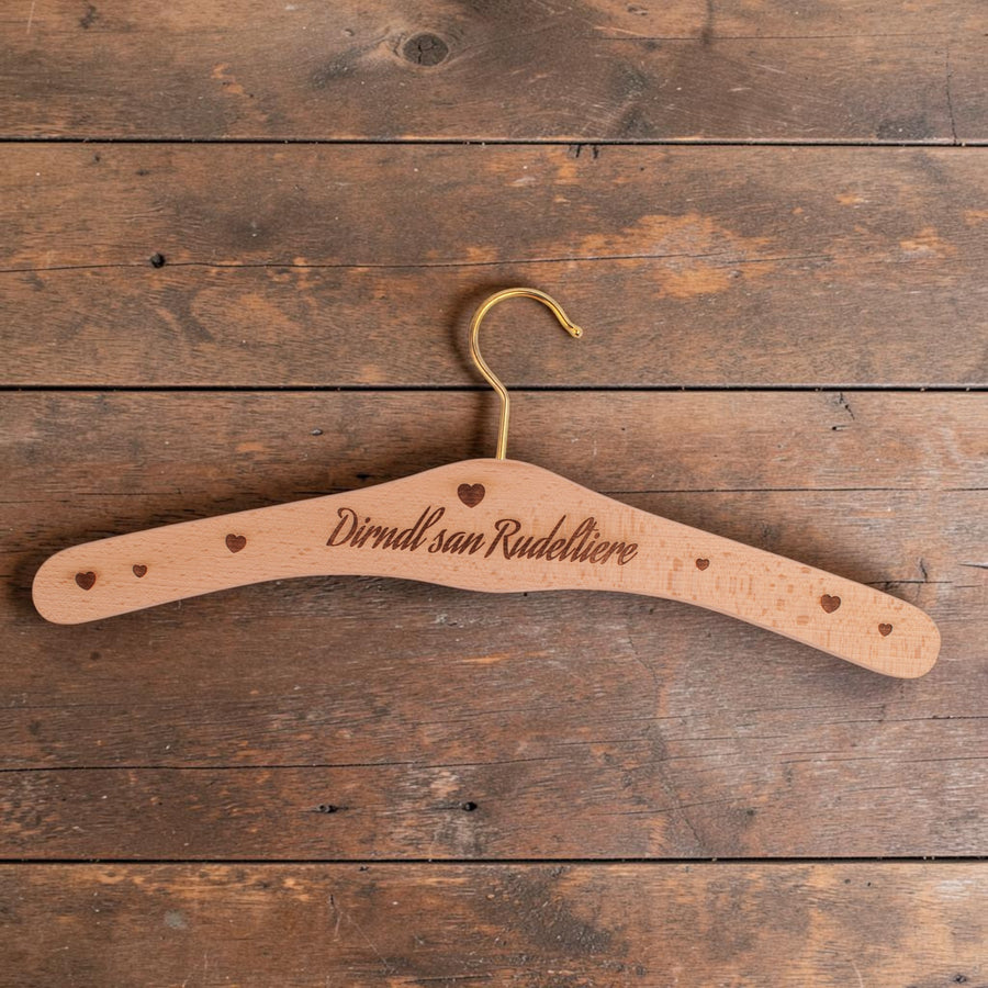 Kleiderbügel "Dirndl san Rudeltiere" von meinherzschlag – Produktbild 1 von 2.